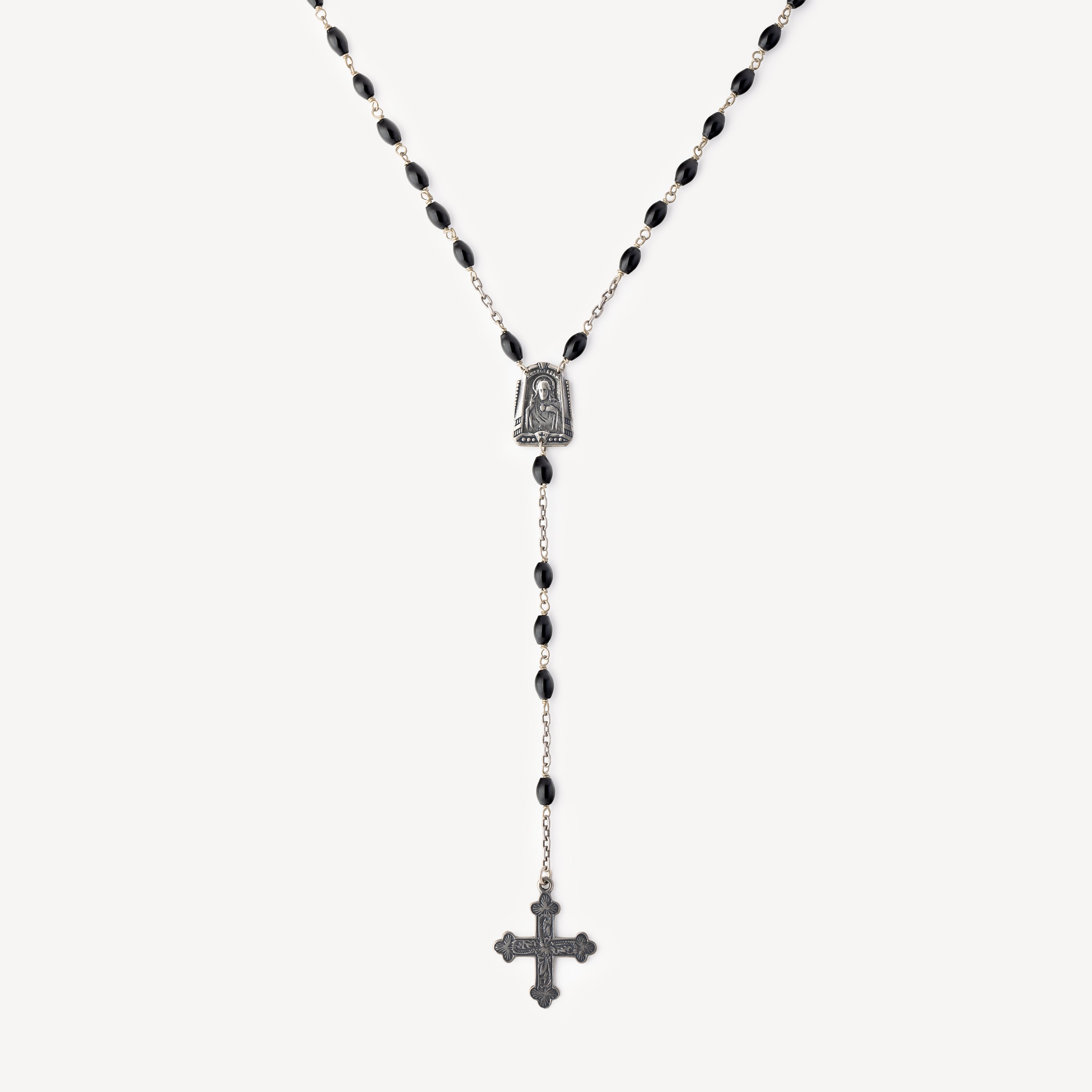 Long necklace with black cross pendant