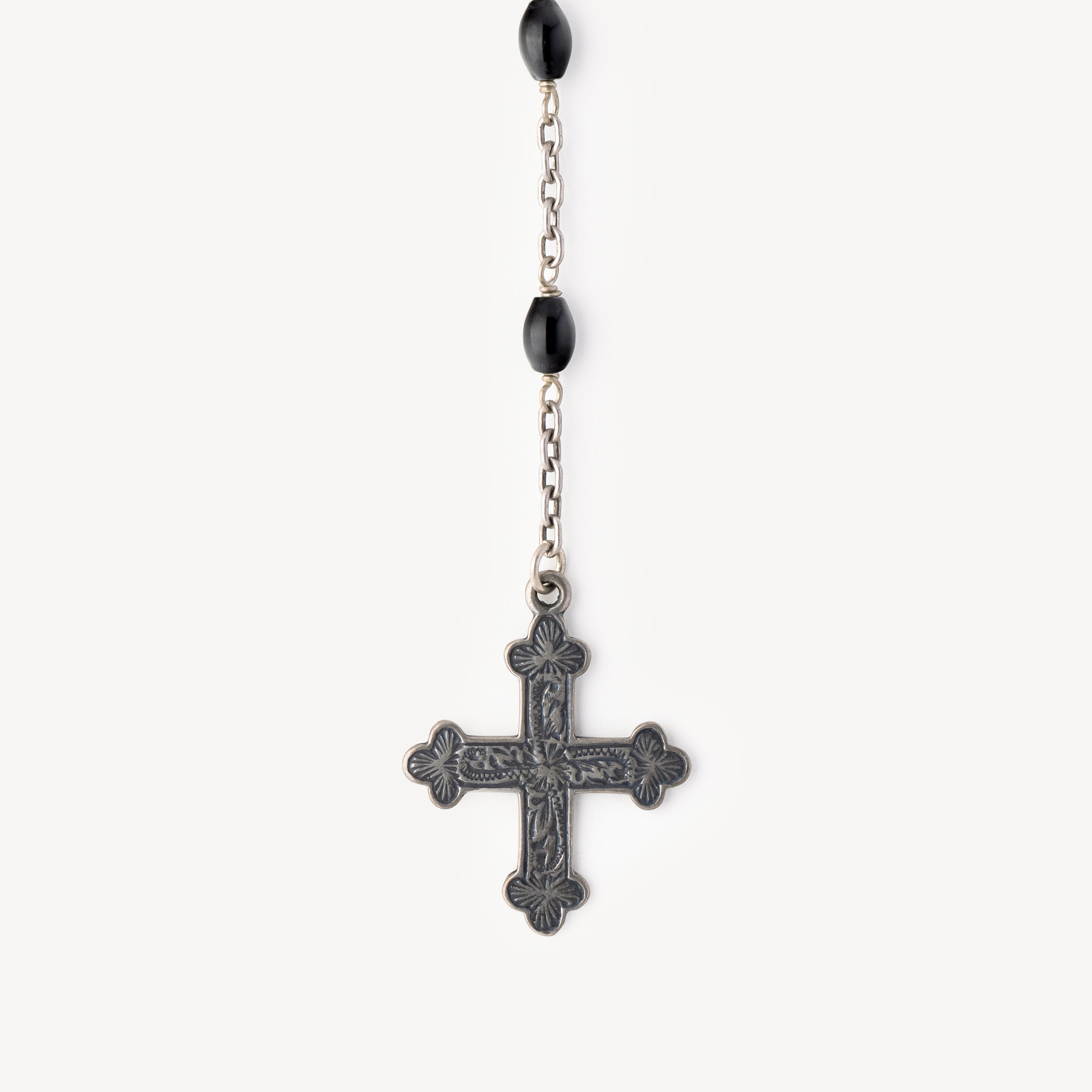 Long necklace with black cross pendant