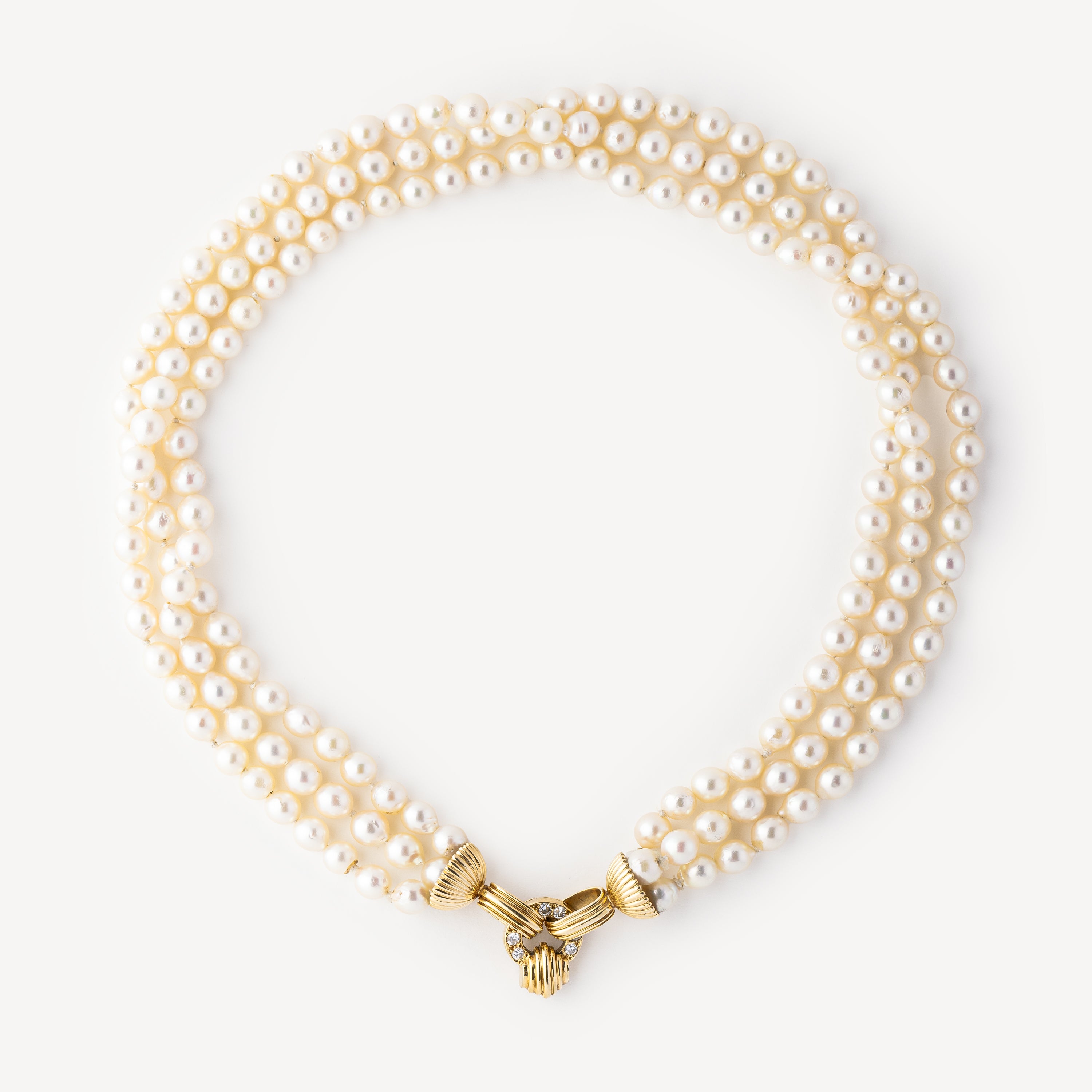 Triple Strand Pearl Necklace