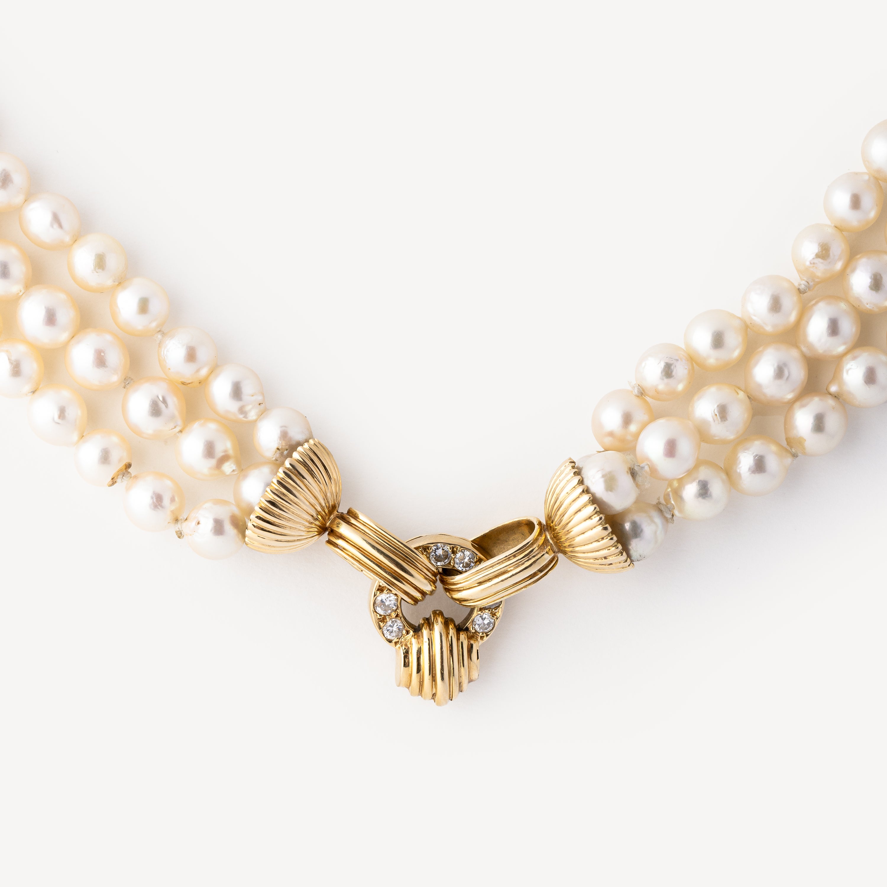 Triple Strand Pearl Necklace