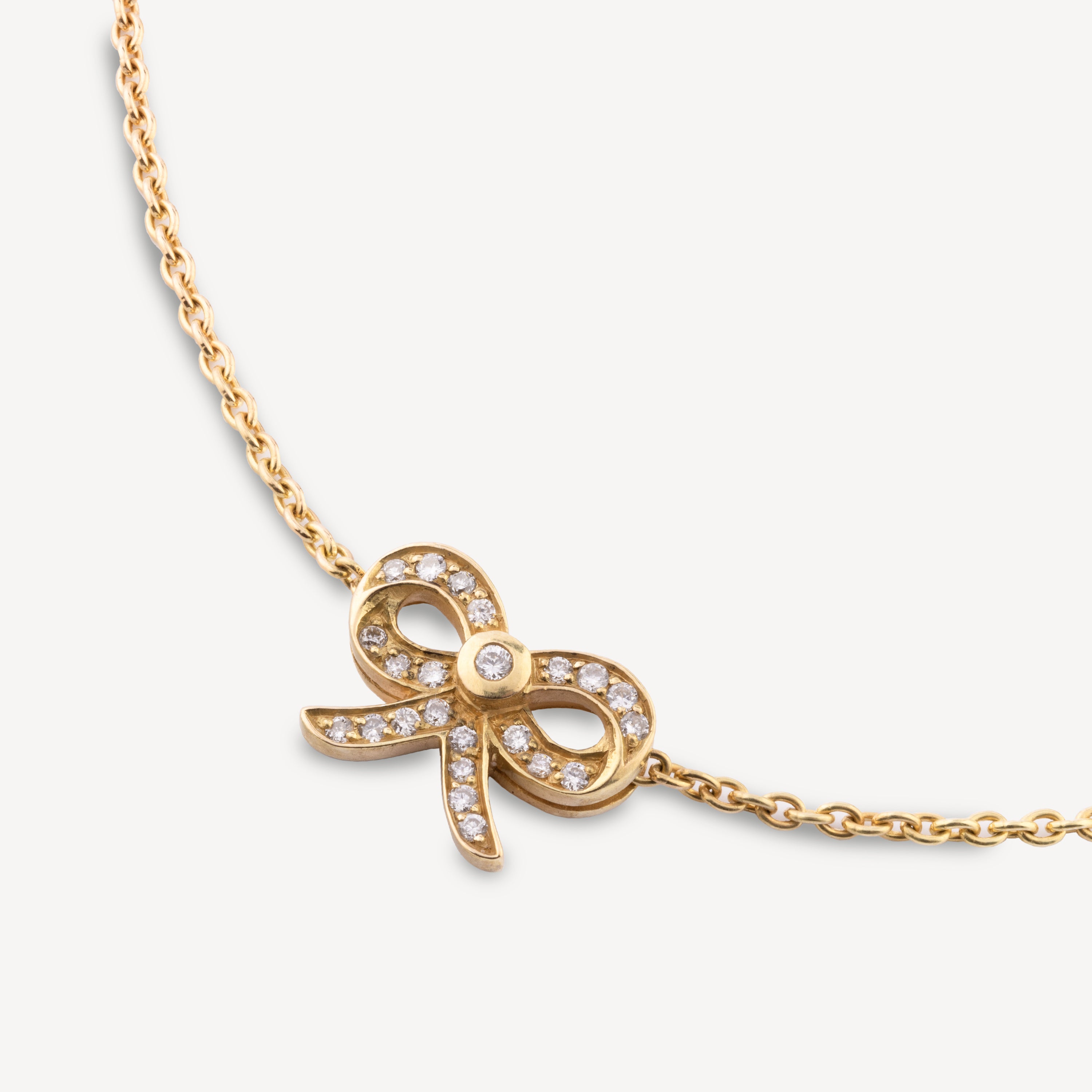 Gold diamond mini bow bracelet