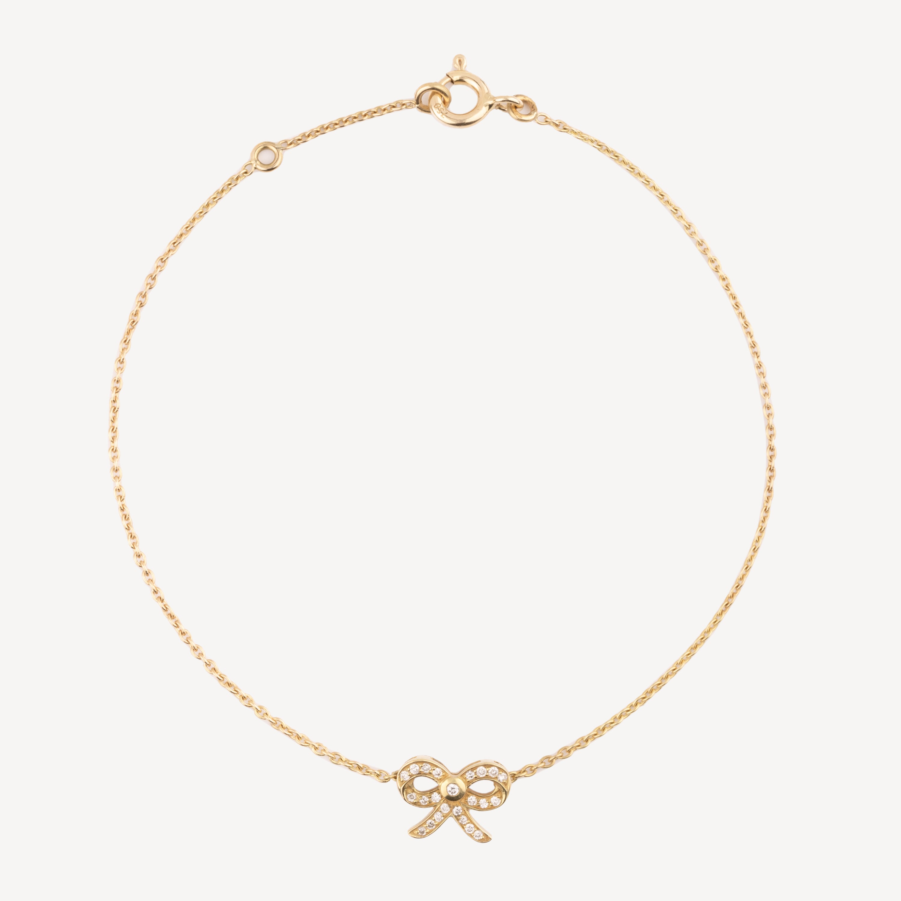 Gold diamond mini bow bracelet