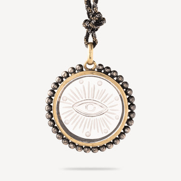 Necklace round carved evil eye